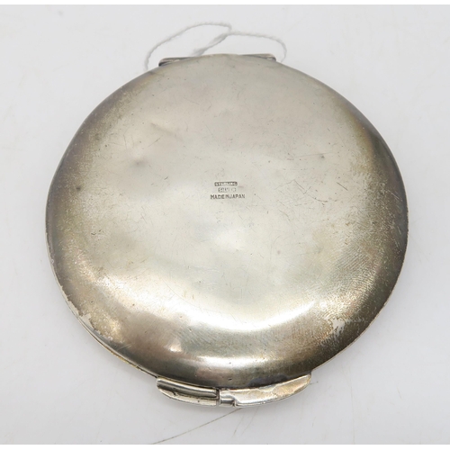 359 - A Japanese silver niello compact, the lid decorated with a landscape scene, 8cm diameter, 80gms