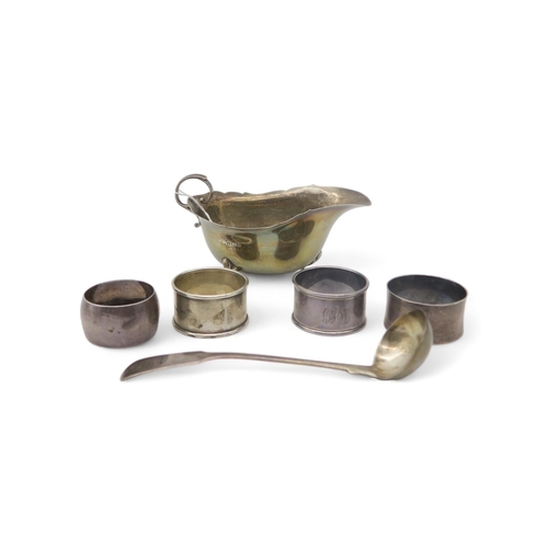 361 - A collection of silver including a silver sauce boat, by Samuel M Levi, Birmingham 1928, four silver... 