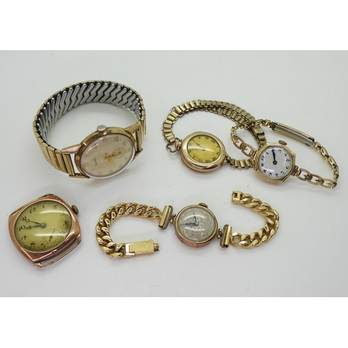 711 - Three 9ct gold ladies watch heads, with gold plated straps, together with two gents examples to incl... 