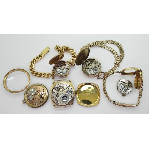 711 - Three 9ct gold ladies watch heads, with gold plated straps, together with two gents examples to incl... 