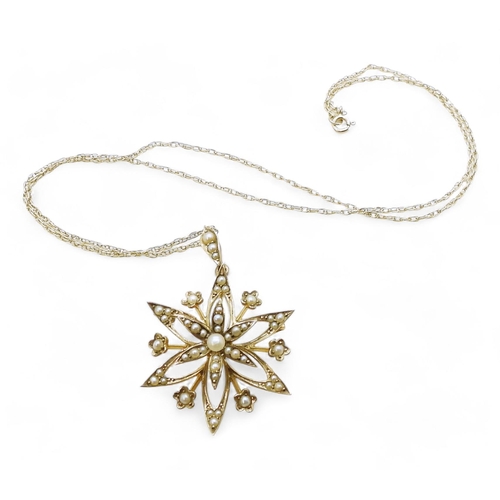 712 - A 9ct gold pearl flower pendant with a 9ct gold rope chain, weight 3.9gms