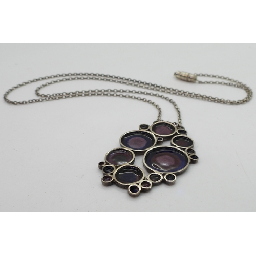 714 - A Norman Grant silver bubbles pendant enamelled in blue, purple and pink. Stamped With NG makers mar... 