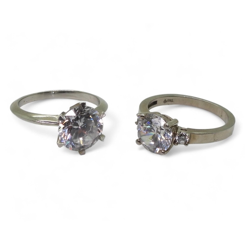 720 - Two white metal mounted 'Tru Diamonds' diamond simulant rings, a solitaire size M1/2, ans a three st... 