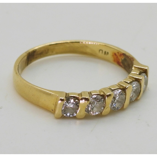 722 - A bright yellow metal five stone diamond ring, set with estimated approx 0.50cts of brilliant cut di... 