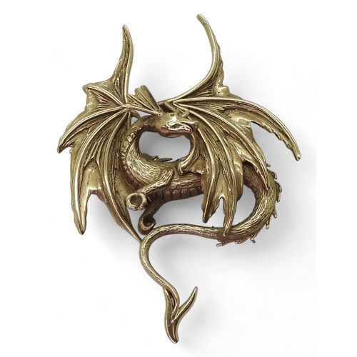 726 - A 9ct gold dragon pendant, dimensions 5.2cm x 3.5cm, weight 10.4gms