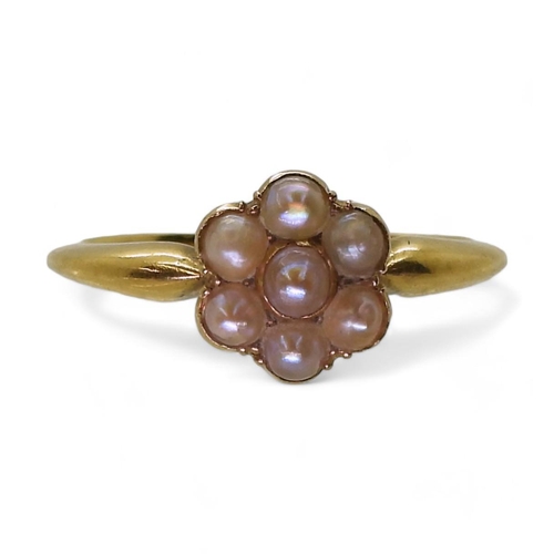 An 18ct gold pearl flower ring with the makers stamp JBs possibly