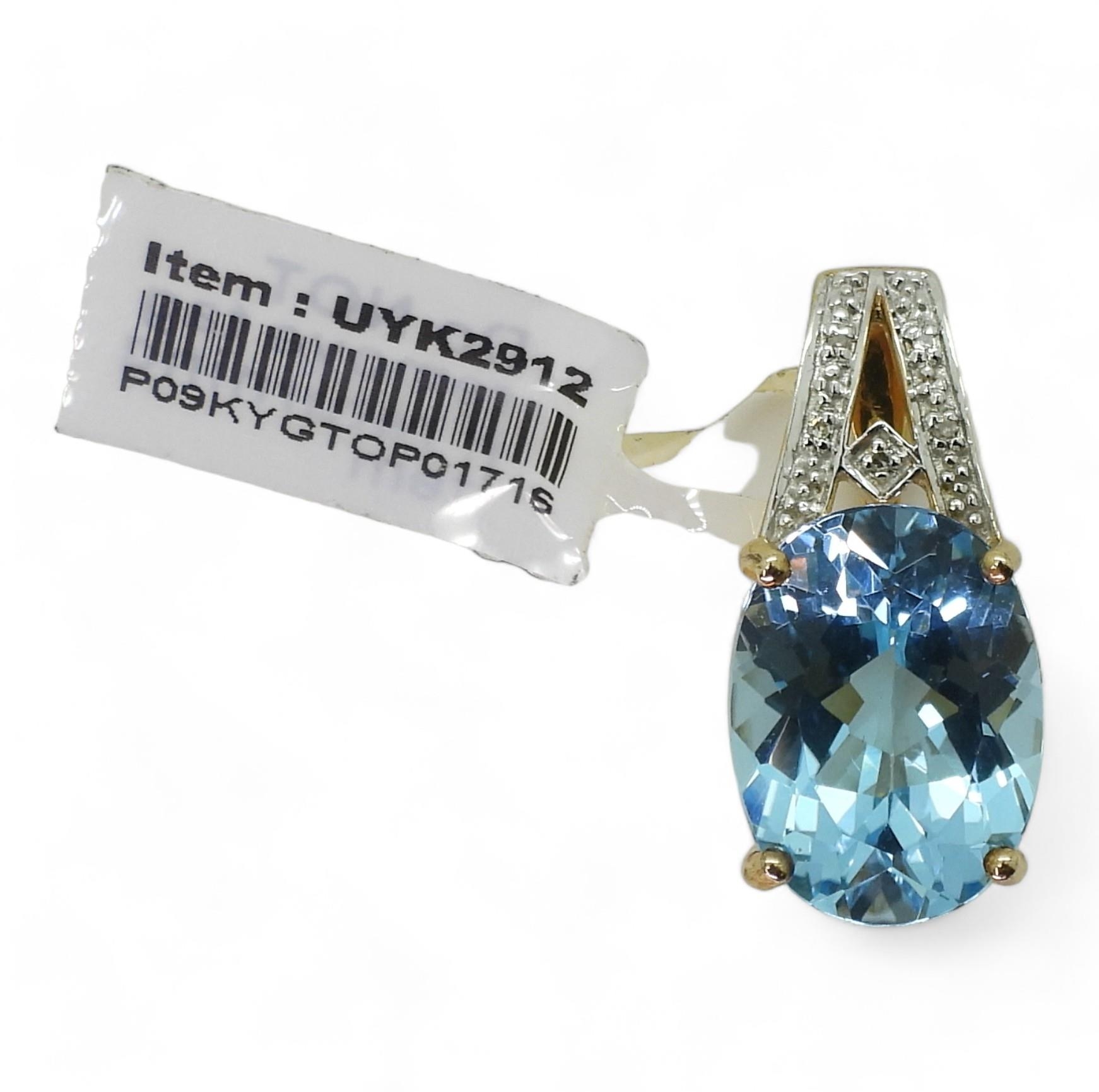 A 9ct gold blue topaz and diamond pendant, weight approx 2.6gms, (tag ...