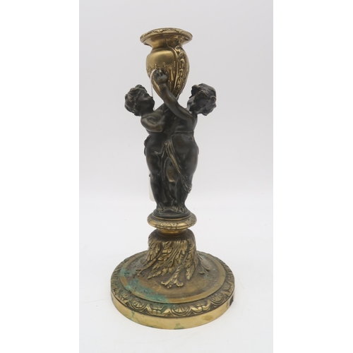 207 - A Doulton style salt glazed Gibraltar Rock Ape, a bronze candlestick/lamp base modelled with cherubs... 