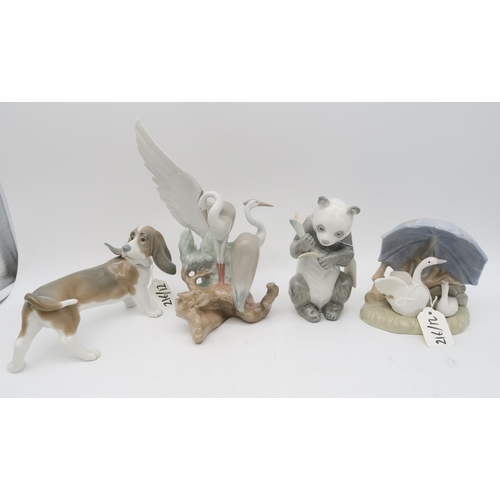 216 - A collection of Lladro and other porcelain animal and bird groups