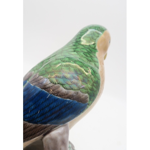 241 - A Chinese glazed pottery parrot figure