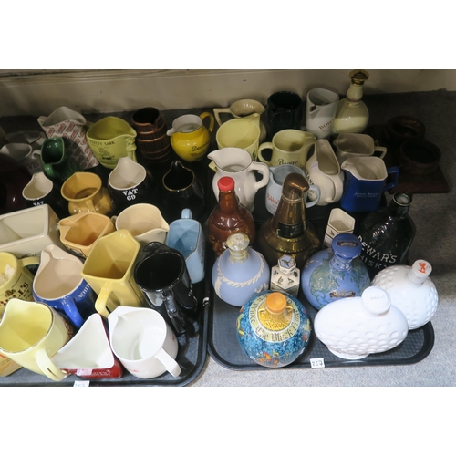 257 - A collection of pottery water whisky jugs and decanters