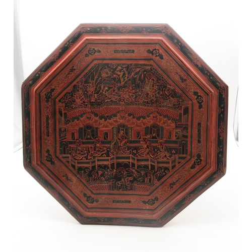 269 - A small lacquered Chinese table with octagonal table