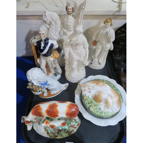 271 - Assorted figures including a flatback of Wellington, a cow butterdish, a Staffordshire cow, a painte... 