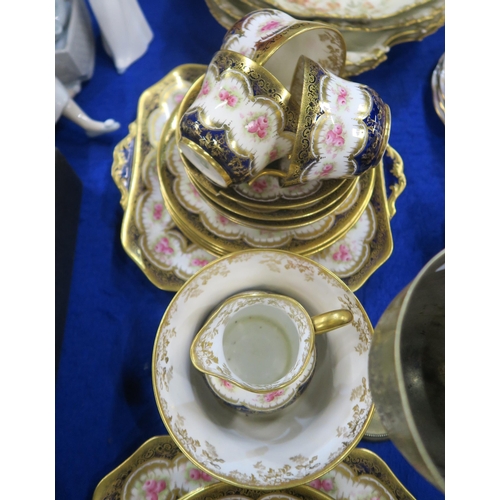 300 - A Paragon China teaset, circa 1912 decorated with pink roses with a gilt and blue border, together w... 