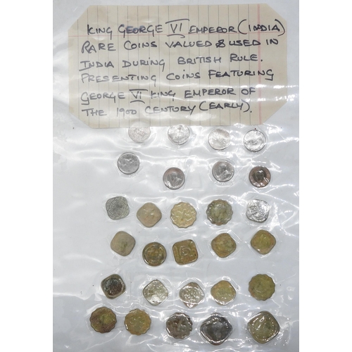 435 - A collection of Indian Sub Continent coins with examples from Indian Mughal Empire and Princely Stat... 