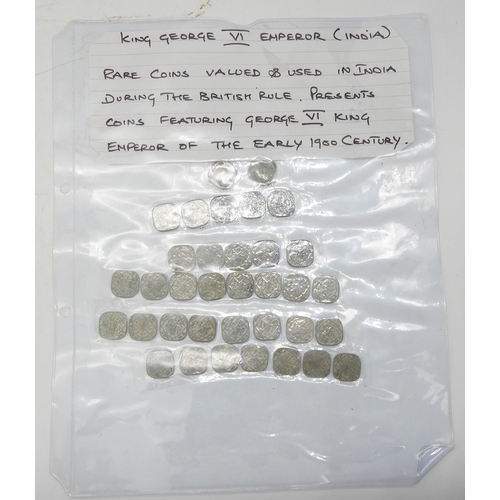 435 - A collection of Indian Sub Continent coins with examples from Indian Mughal Empire and Princely Stat... 