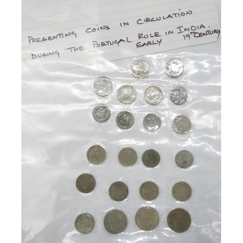 435 - A collection of Indian Sub Continent coins with examples from Indian Mughal Empire and Princely Stat... 