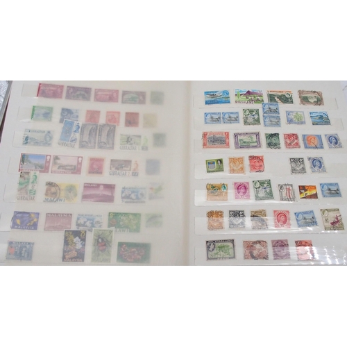 452 - A worldwide collection of stamps in five albums with early Great Britain, Australia, Belgium, Britis... 