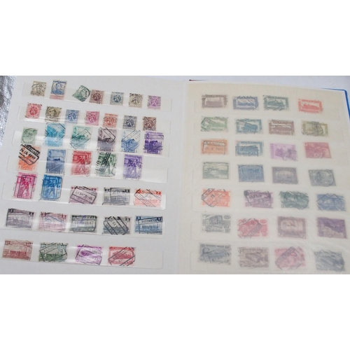 452 - A worldwide collection of stamps in five albums with early Great Britain, Australia, Belgium, Britis... 