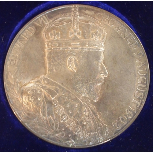 542 - Two cased Edward VII 1902 Coronation Medals, each retaining its original paper packet (2)