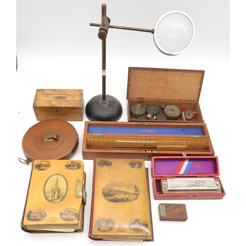 560 - A mixed lot, comprising a leather-cased 100ft tape measure by Hockley Abbey, desk magnifier on heavy... 