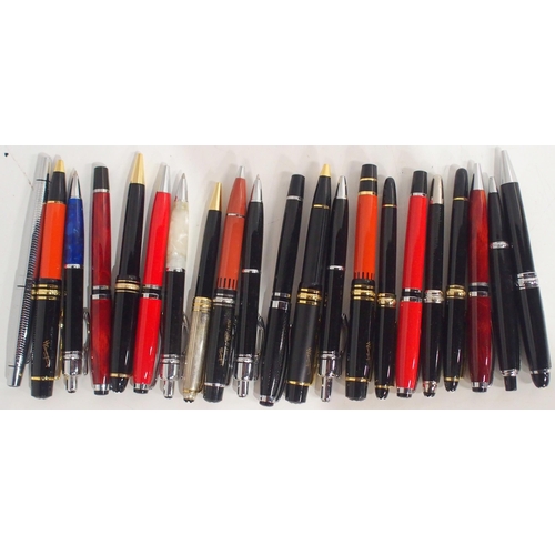 565 - A collection of Mont Blanc ballpoint pens, including Hemingway examples