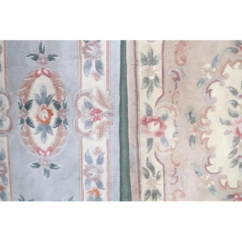 106 - A lot of two assorted Aubusson style floral rugs, larger with beige ground, 164cm long x 90cm wide a... 