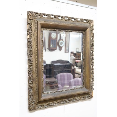 141 - A lot comprising gilt Rococo style framed bevelled glass wall mirror, 75cm high x 65cm wide and anot... 