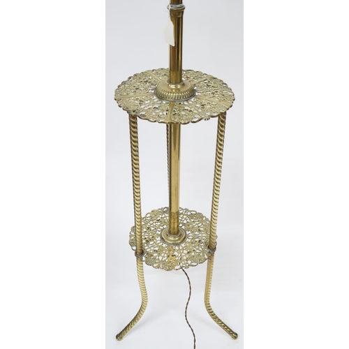 23A - A brass two tiered standard lamp, 195cm high
