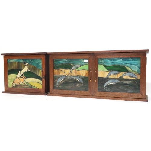 4 - A lot comprising two assorted 20th century stained glass hanging cabinets the larger having two lead... 