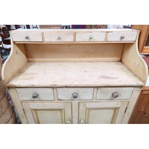 62 - A late Victorian Scotch pine farmhouse style kitchen dresser with four short drawers over open top a... 