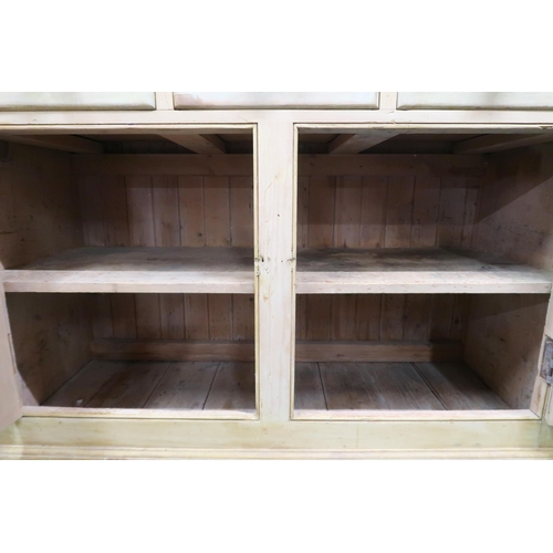 62 - A late Victorian Scotch pine farmhouse style kitchen dresser with four short drawers over open top a... 