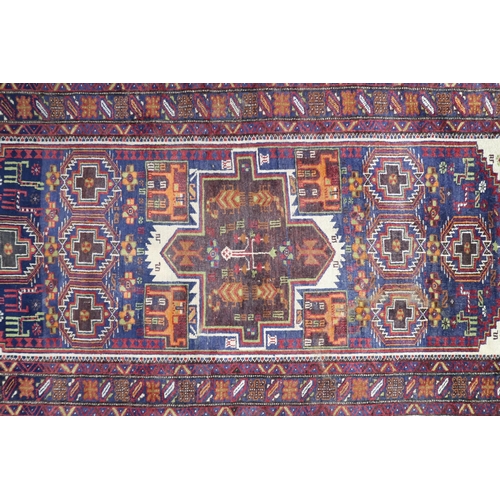 82 - A light blue ground Hamadan rug with geometric central medallion, cream spandrels and multicoloured ... 