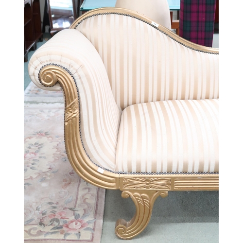 84 - A late 19th/early 20th century gilt framed chaise longue on scrolled supports, 89cm high x 202cm lon... 