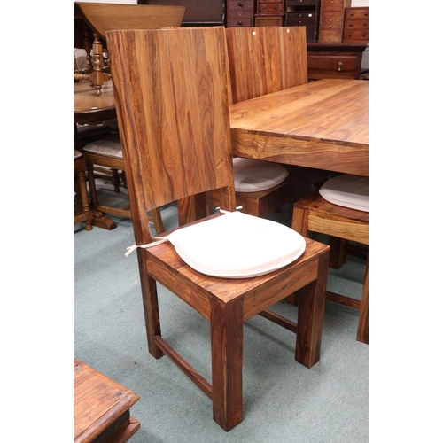 90 - A contemporary mangowood dining table and eight chairs, table with square supports, 76cm high x 175c... 