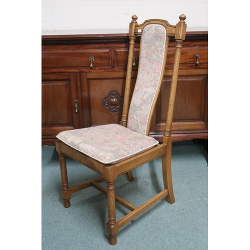 97 - A 20th century Ercol elm and beech extending dining table and six chairs, table on trestle supports ... 