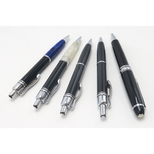 565 - A collection of Mont Blanc ballpoint pens, including Hemingway examples