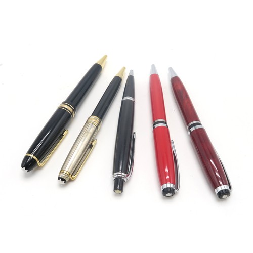 565 - A collection of Mont Blanc ballpoint pens, including Hemingway examples