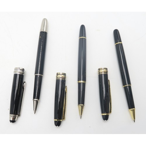 565 - A collection of Mont Blanc ballpoint pens, including Hemingway examples