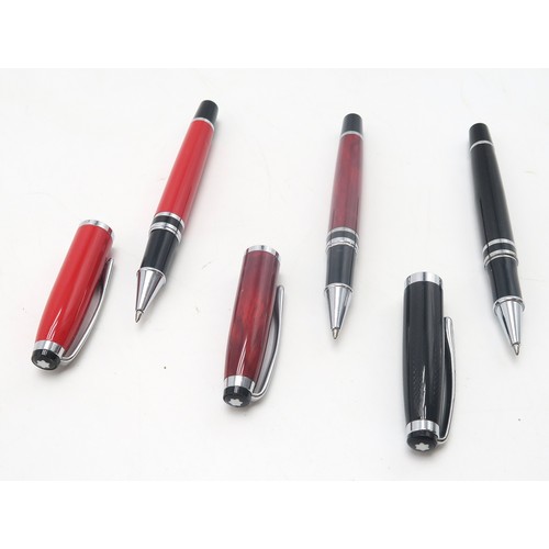 565 - A collection of Mont Blanc ballpoint pens, including Hemingway examples