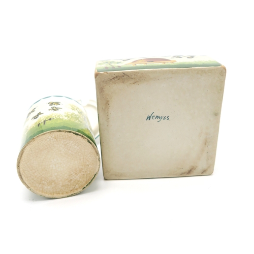 203 - A Wemyss ware honey box and cover with stand, another honey box and cover and a cylindrical honey po... 