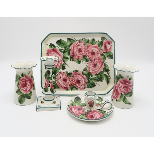 207 - A collection of Wemyss ware including a cabbage rose decorated tray 30cm x 25cm, a pair of wavy... 