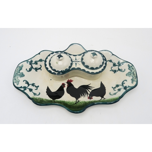 208 - A Wemyss ware black cockerel and hens double inkwell26cm wide, together with a tyg, 10cm high (2)... 