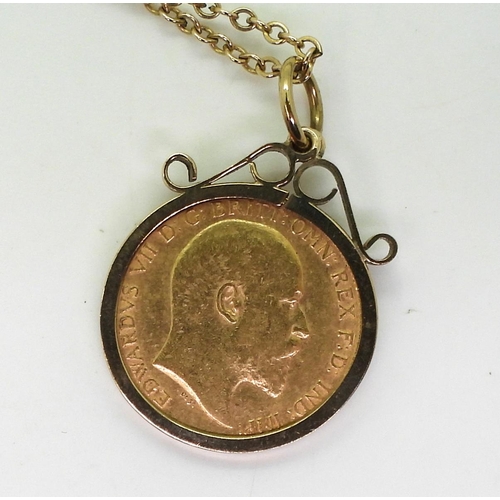 707 - A 1902 gold half sovereign in 9ct gold pendant mount with 51cm yellow metal chain (clasp gold plated... 