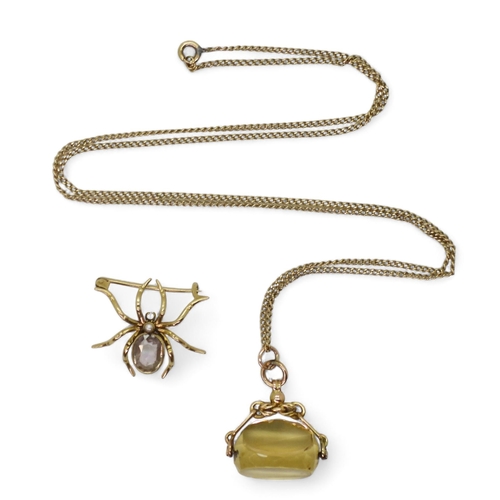 A yellow metal amethyst spider brooch, together with a 9ct gold citrine fob seal (af) and 68cm chain, weight together  19.3gms