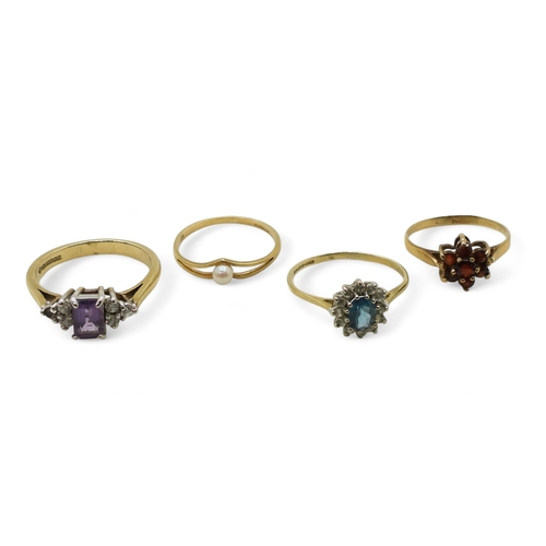 Four 9ct gold rings, amethyst and cz size N, blue topaz and cz, size M1/2, garnet size K1/2, and pearl L1/2, weight together 5.2gms