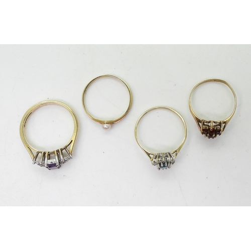 724 - Four 9ct gold rings, amethyst and cz size N, blue topaz and cz, size M1/2, garnet size K1/2, and pea... 