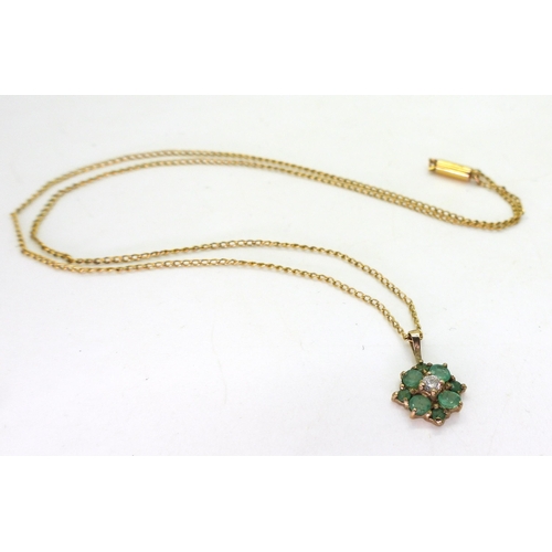 734 - A yellow metal emerald and diamond flower pendant on a 9ct gold Ciro fine curb chain, length 40cm, w... 