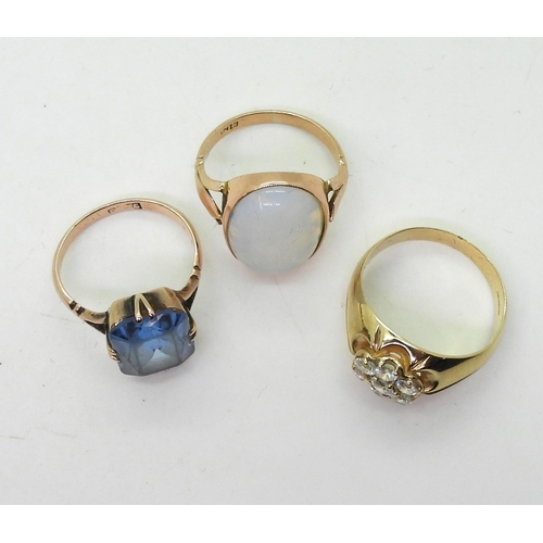 742 - Three 9ct gold rings, cz flower ring size R1/2, opalite glass size P, blue glass size o, weight comb... 