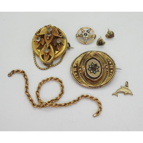 758 - A collection of gold and yellow metal to include two Victorian brooches one as found, a Eastern Star... 